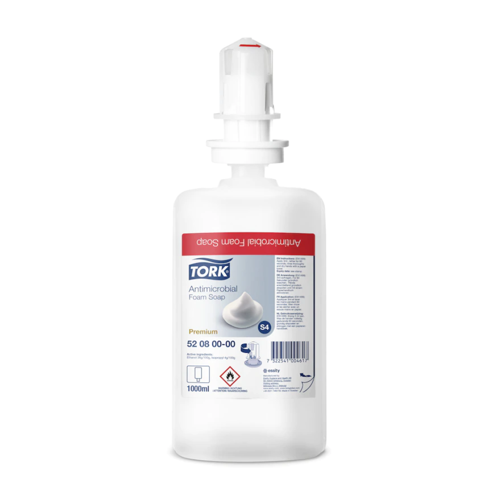 En 1000 ml Tork 520800 skumtvål för handdesinfektion Premium S4 flaska från TORK - Essity Professional Hygiene Germany GmbH, med vit dispenserhuvud och röd etikett. EN 1499 certifierad, idealisk för effektiv handdesinfektion.