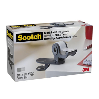 En låda med Scotch™ Clip & Twist tejphållare C19, grå med Scotch® Magic™ Osynlig tejp (19 mm × 33 m, 4 rullar) från 3M Deutschland GmbH står på ett skrivbord. Förpackningen visar engelska, franska och tyska uppgifter.