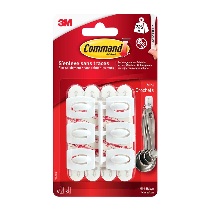 Command™ Mini-kroken, 17006 från 3M Deutschland GmbH innehåller sex vita krokar med klisterremsor för skonsam, borrfri upphängning. Lätt att ta bort utan rester; levereras i röd-vit förpackning.