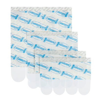 Fyra Multipack Command™ Strips, transparent 17200CLR från 3M Deutschland GmbH, med synligt blått varumärke och klara dragflikar - perfekt för spårlös väggfästning och enkel användning.